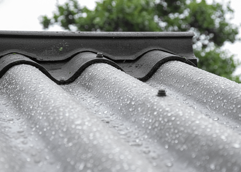 After Roof Waterproofing—Clean, sealed surface with even waterproof coating applied.
